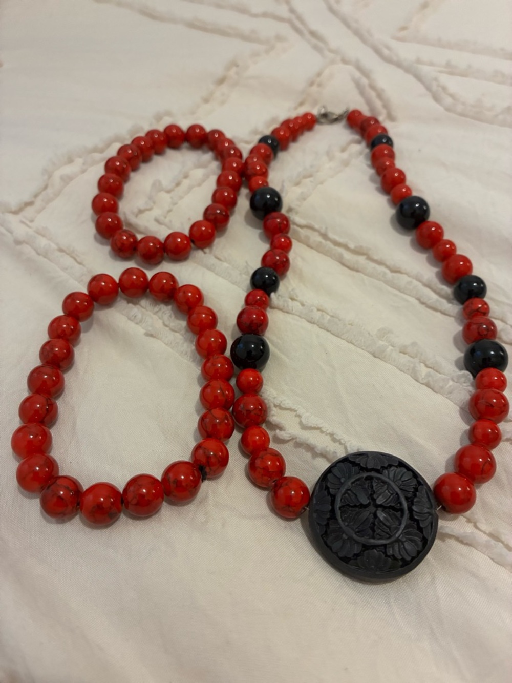 Red Beaded Necklace and Bracelet Set with Black Carved Pendant